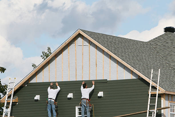 Professional Siding Installation technician working in Stahlstown, PA